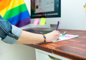 Lesbian worker a her desk.